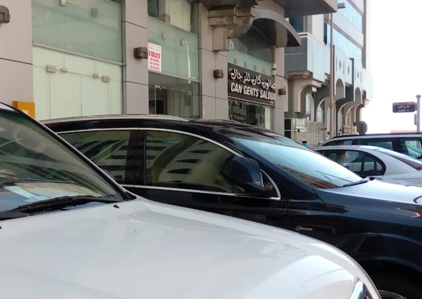 Public parking available in front of Can Gents Salon